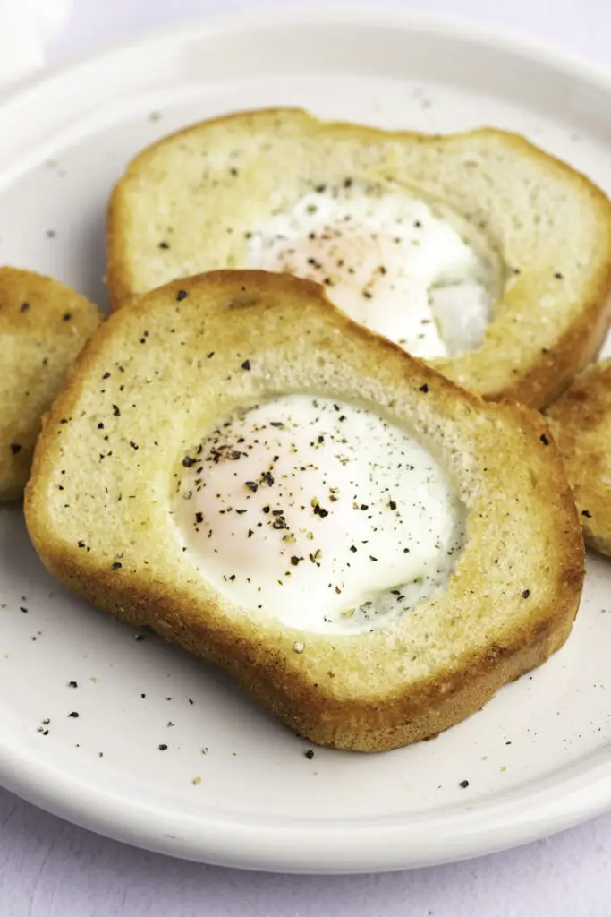 Eggs In A Basket Covered With Pepper