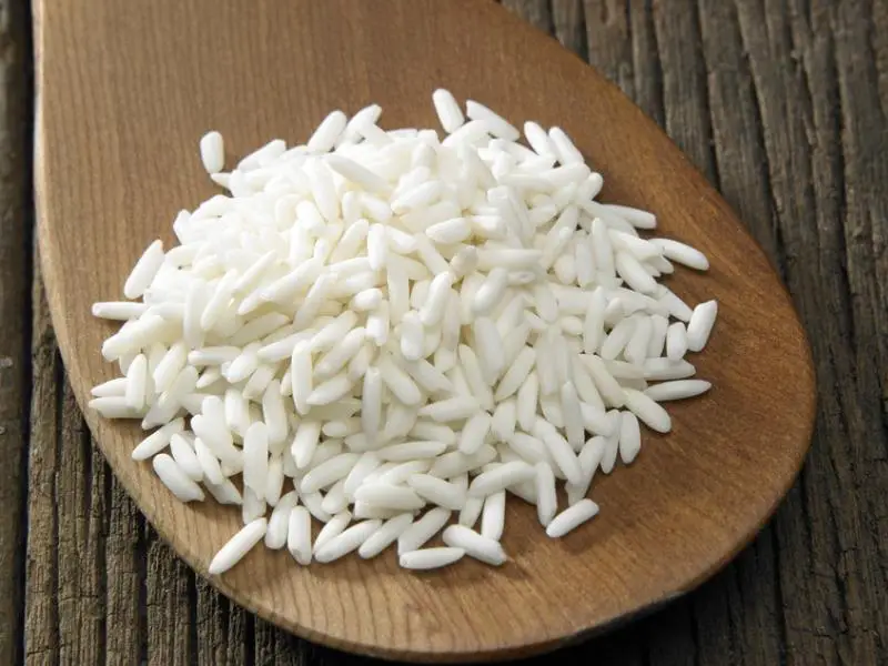 glutinous rice in a wooden spoon